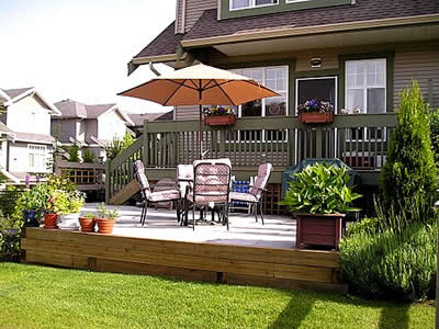 4x6 Retaining Wall, Steps up to the patio, Garden Bed Installation, 12x12 natural grey stone installation